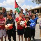 النبي صالح: نشطاء يرفعون البطاقات الحمراء دعما  لوقف عضوية الاحتلال في الفيفا