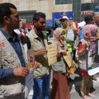 بالصور... وقفة لمكافحة عمالة الأطفال في الخليل