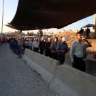 بالصور: حاجز قلنديا صباح الجمعة الأخيرة من شهر رمضان