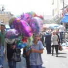 استعدادات استقبال عيد الفطر بالخليل