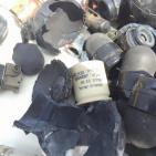 فلسطينيان يستعرضان قنابل  الاحتلال في باحات الاقصى