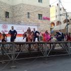 فرقة الهدف للدبكة  الشعبية و فرقة كنعان للتراث والفنون الشعبية في سوق الحرجة رام الله