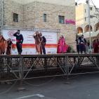 فرقة الهدف للدبكة  الشعبية و فرقة كنعان للتراث والفنون الشعبية في سوق الحرجة رام الله