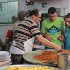 بالصور تجهيزات وأجواء العيد بمدينة نابلس اليوم