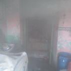 اشتعال النيران في منزل خلال المواجهات مع الاحتلال بالخليل