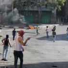 بالصور: ثلاث اصابات في مواجهات باب الزاوية بالخليل