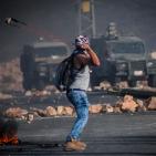 بالصور: مواجهات مستمرة منذ الصباح حتى اللحظة في حي البالوع - البيرة