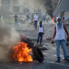 بالصور: مواجهات مستمرة منذ الصباح حتى اللحظة في حي البالوع - البيرة