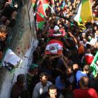 تشييع جثماني الشهيدين محمد شماسنة وعمر الفقيه في بلدة قطنا شمال غرب القدس،