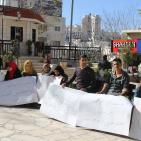 بالصور... وقفة احتجاجية لموظفي مستشفى المحتسب بالخليل