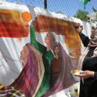 رسم جدارية الحرية في مدرسة بنات الازور في البيرة