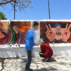 رسم جدارية الحرية في مدرسة بنات الازور في البيرة