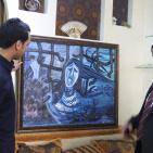 الخطاط الصغير عيسى.. صنع منه السجن فنانا كبيراً