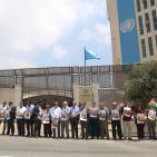 وقفة تضامنية مع الاسير الصحفي عمر نزال وبلال كايد امام مقر الامم المتحدة في رام الله