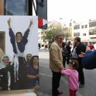 معرض صور للشهيد ياسر عرفات وسط رام الله للمصور جمال العاروري