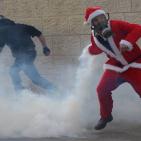 قوات الاحتلال تقمع بالرصاص والغاز مسيرة لـ