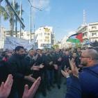 رام الله: مواطنون يحتفلون بقرار الرئيس وقف نفاذ قانون الضمان