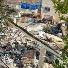 بالصور: الاحتلال يجبر مقدسيا على هدم منزله في جبل المكبر