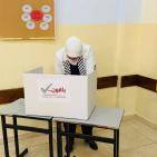 بالصور| غنام تدلي بصوتها في الانتخابات المحلية بدير دبوان