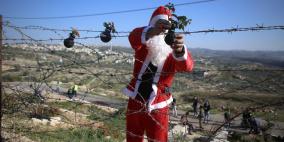 الاحتلال يقمع مسيرة بابا نويل في بلعين