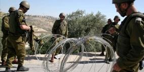 الاحتلال يغلق طريق القدس-الخليل المحاذي لبلدة بيت أمر