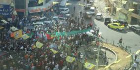 المئات يشاركون في مسيرة نصرة للأسير علان في الخليل