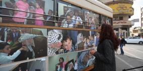 معرض صور للشهيد ياسر عرفات وسط رام الله للمصور جمال العاروري