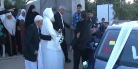 بالصور: عروس في غزة تقيم مراسم زفافها بلا عريس