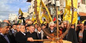 ايقاد شعلة الانطلاقة ال 51  وسط مدينة قلقيلية