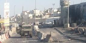 مواجهات قرب حاجز قلنديا عقب تشيع جثمان الشهيد محمد لافي