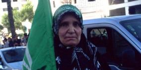 الأسيرة المحررة "أم حسن" وأولادها العشرة ما بين شهيد ومبعد وأسير