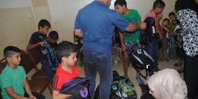 مركز يافا الثقافي يوزع حقائب مدرسية وقرطاسية على منتسبيه