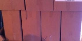 بالصور: توزيع طرود غذائية على القدس