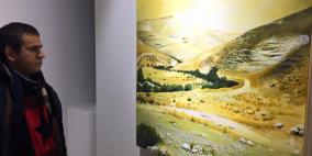 الفنان تقي سباتين ينظم معرض الارض المقدسة في البيرة