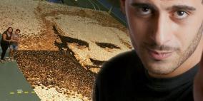 الفنان هاني خوري يعبر عن الجوع بأكبر لوحة من"الخبز المحمص" ويدخل جينيس