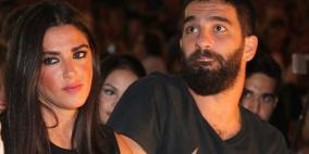  توران يهدد صحفيا تحدث إلى زوجته