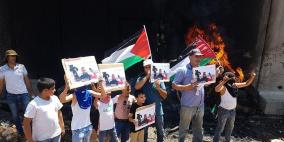 مسيرة في نعلين رفضا لاعتقال الصحفيين