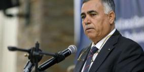 وزير الحكم المحلي: شرعنا بتفعيل قانون تعديات البناء