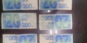 القبض على شخصين يشتبه بتداولهما نقود مزيفه في سلفيت