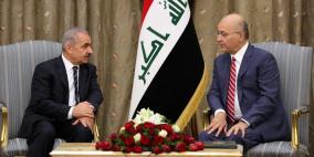 اشتية يلتقي الرئيس العراقي