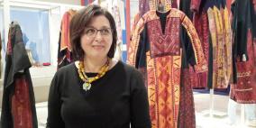 "أبو شوشة" سيدة الأثواب الفلسطينية