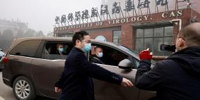 فريق تحقيق منظمة الصحة يزور مختبرا للفيروسات في ووهان