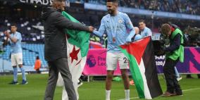 بالصور.. النجم رياض محرز يرفع علم فلسطين في بريطانيا