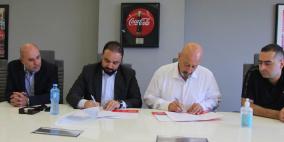 المشروبات الوطنية توقع اتفاقية لرعاية اكاديمية كروية للناشئين لنادي هلال القدس