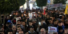 صور: فعاليات إسنادية للأسير ناصر أبو حميد في رام الله ونابلس