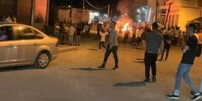 بالفيديو: إصابات وإحراق منازل خلال شجار في بيت أمر شمال الخليل 