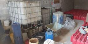 بالصور: ضبط مخزن يحوي مواد مغشوشة ومزورة في نابلس