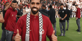 كابتن منتخب قطر يتوشح الكوفية خلال التدريبات استعدادا لكأس العالم