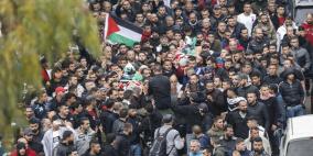 بالصور: جماهير غفيرة تشيع جثماني الشهيدين الشقيقين الريماوي