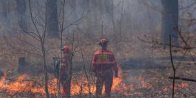 إجلاء آلاف السكان في أنحاء كندا جراء حرائق الغابات